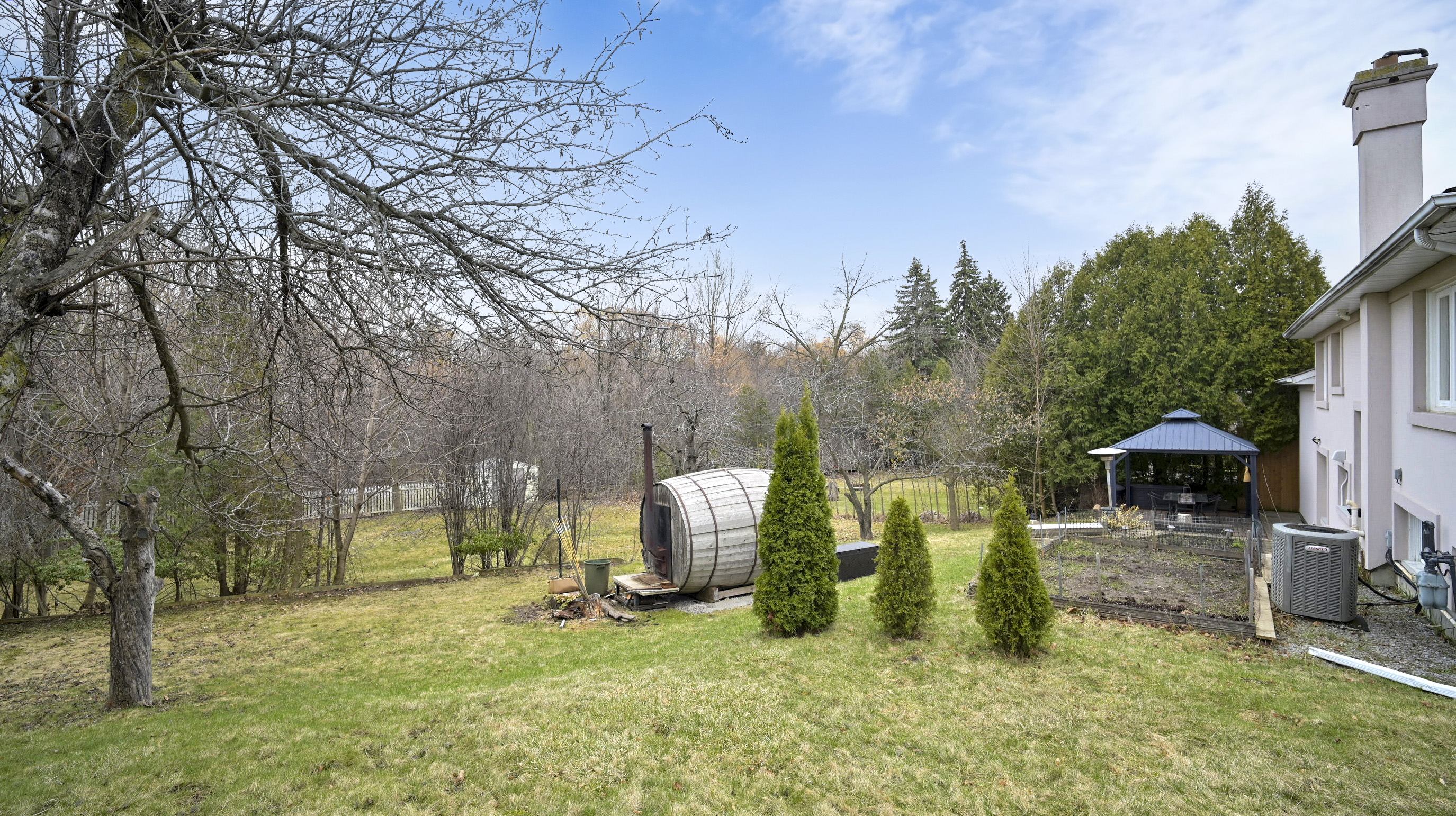 Ravine-like backyard setting at 25 McManus Rd